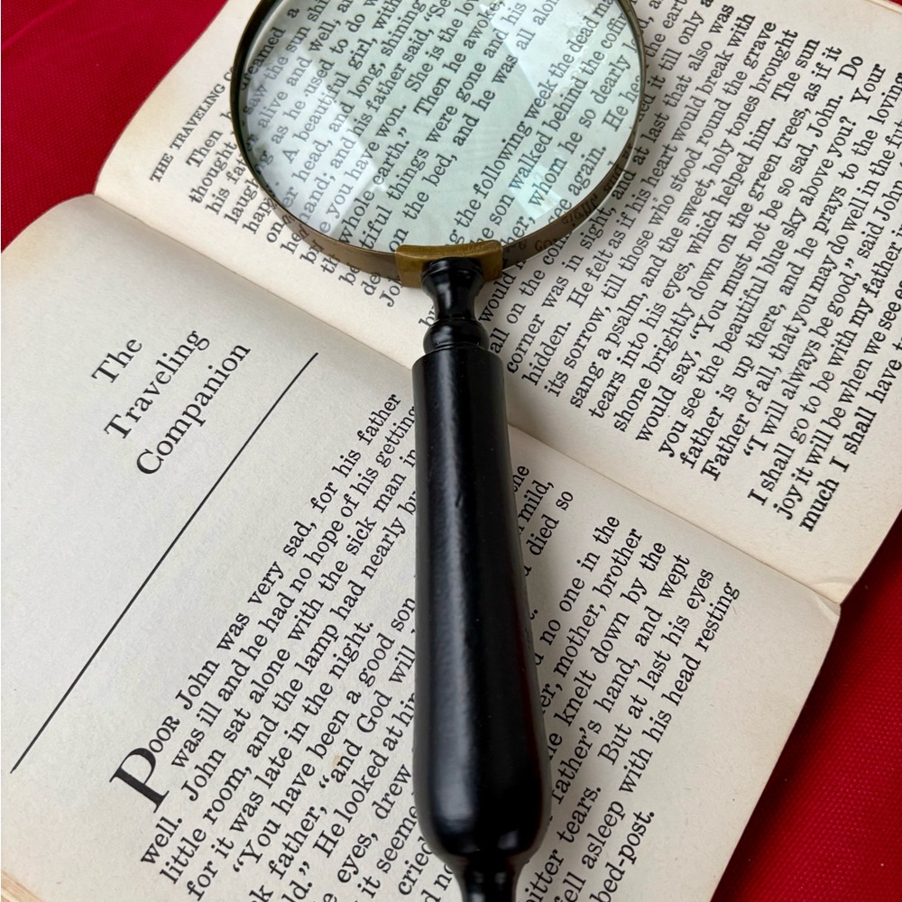 Elegant Black and Gold Magnifying Glass